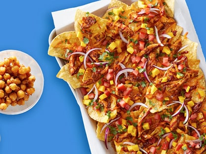 bowls of chili, chickpeas and nachos