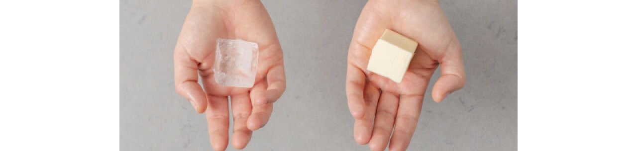 Ice and butter in hands